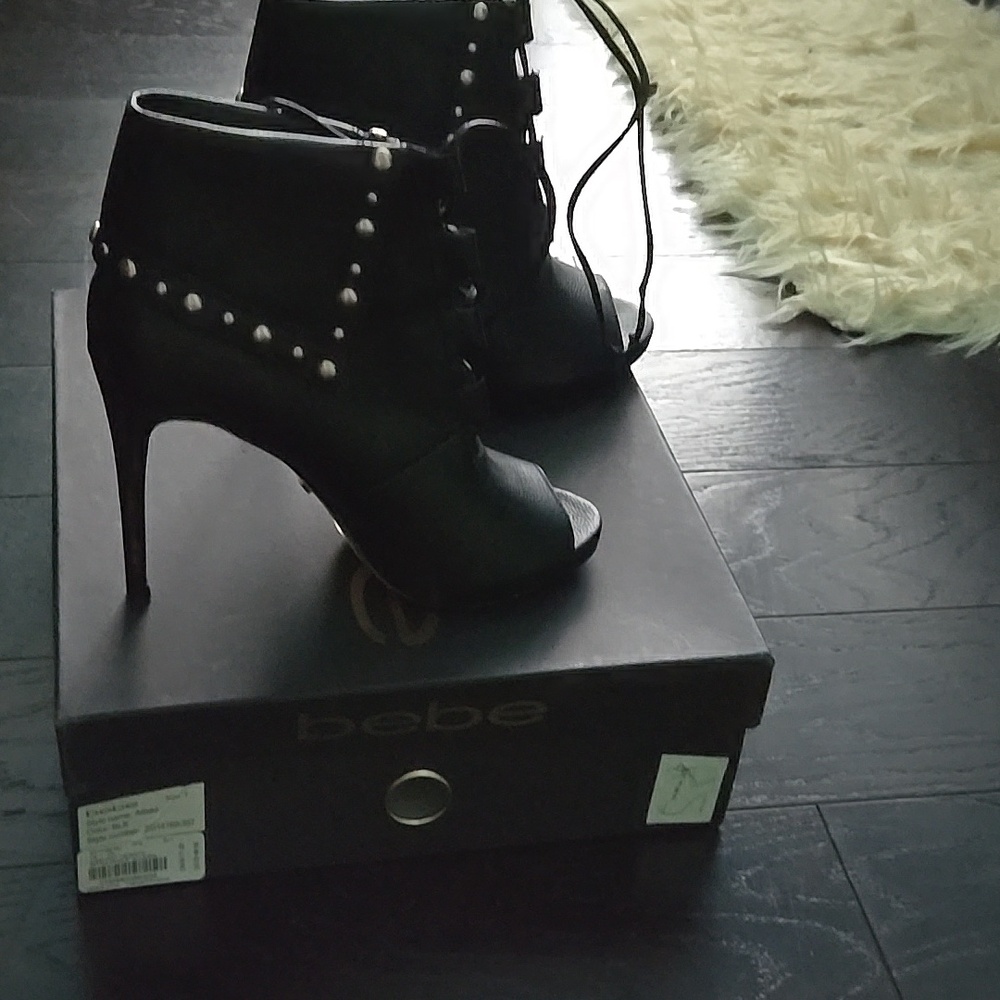 Bebe, size 7, color black